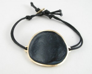 Black enamel disk bracelet from Dawn Baker